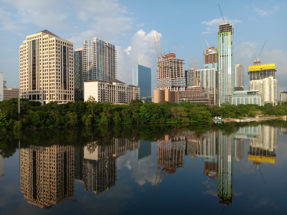 Downtown Austin, TX skyline reflected in the river